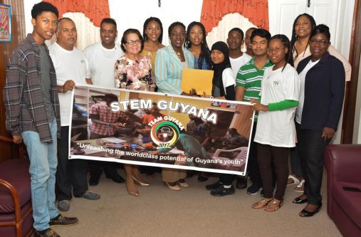 First Lady Mrs Sandra Granger, Minister of Education, Nicolette Henry and the members of the Guyana STEM Robotics team  