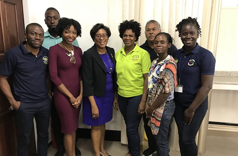 Public Telecommunications Minister, Cathy Hughes (center) pictured with representatives of the Department of Youth and Culture, the Ministry of Education, NDMA and STEM Guyana