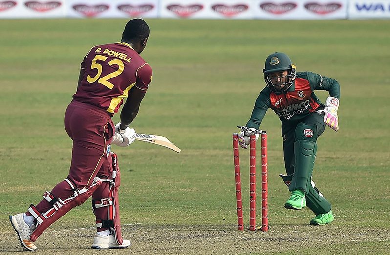 Rovman Powell is stumped by Mushfiqur Rahim in trying to force the pace, Bangladesh vs West Indies, 2nd ODI, Dhaka, yesterday.