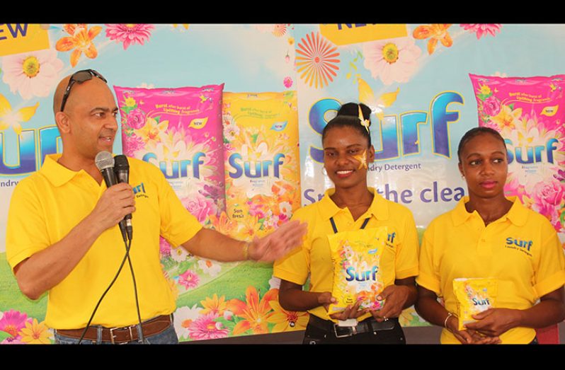 Massy Trading Director, Troy Beharry and other company staff at the launch Saturday of the new detergent