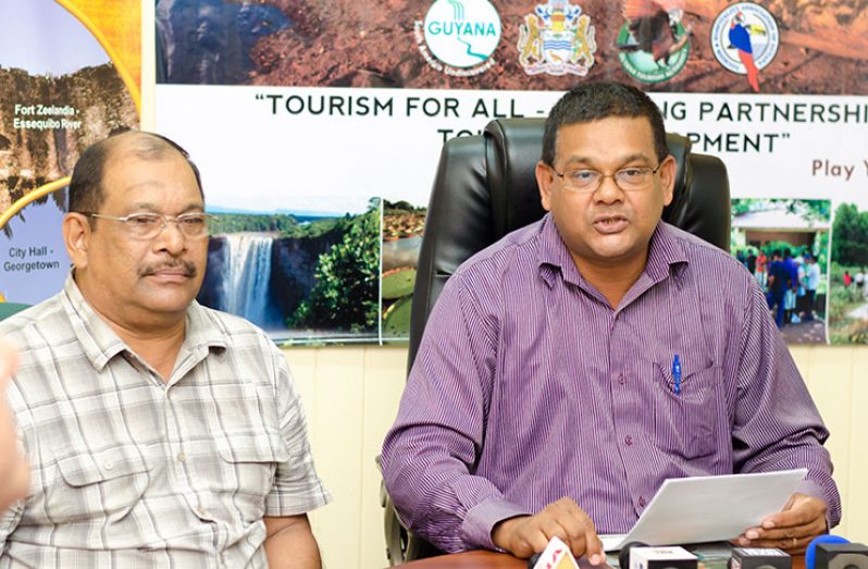 GTA Director, Mr Indranauth Haralsingh (right) and safari coordinator, Mr Frank Singh at yesterday’s press conference (Photo by Delano Williams)