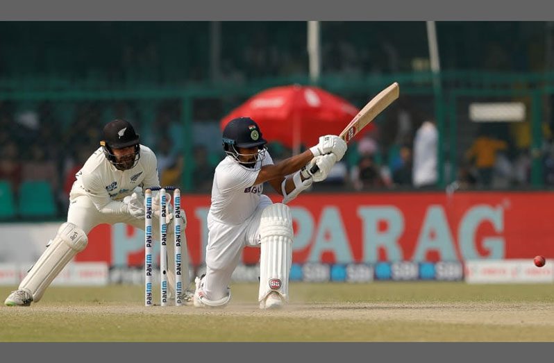 Wriddhiman Saha struck an unbeaten 61 after being off the field with a stiff neck on day three (BCCI)