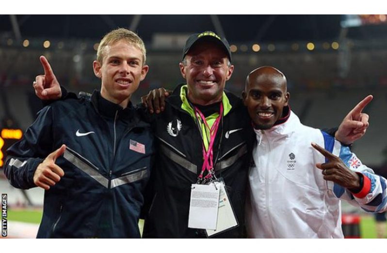 Alberto Salazar (centre) alongside Farah (right) and training partner Galen Rupp at the London 2012 Olympics