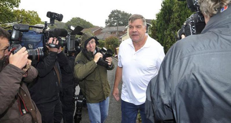 Former England soccer manager Sam Allardyce speaks to media as he leaves his home in Bolton, Britain, yesterday. (REUTERS/Chris Neill)
