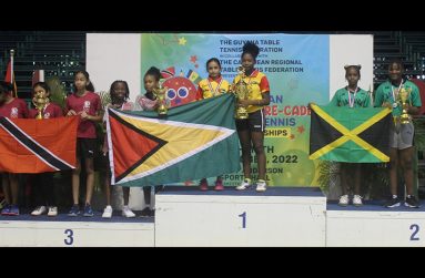 Samara Sukhai and Jasmine Billingy (middle) followed up their team gold with a gold in the Girls U13 Doubles.