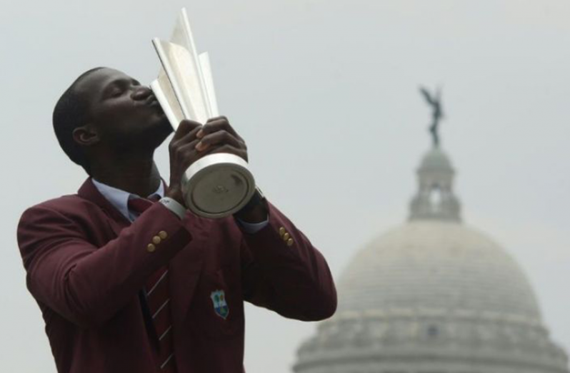 West Indies led by Darren Sammy  won the 2016 World Twenty20 in India (AFP Photo/Dibyangshu SARKAR)