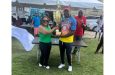 Flashback: Ariel Masters skipper Samuel Kingston receives the winning trophy from Shurine Samaroo, wife of Regal Stationery & Computer Centre proprietor, Mahendra Hardyal after his team carted off the Masters Over-40 title in last month’s Republic Cup tournament