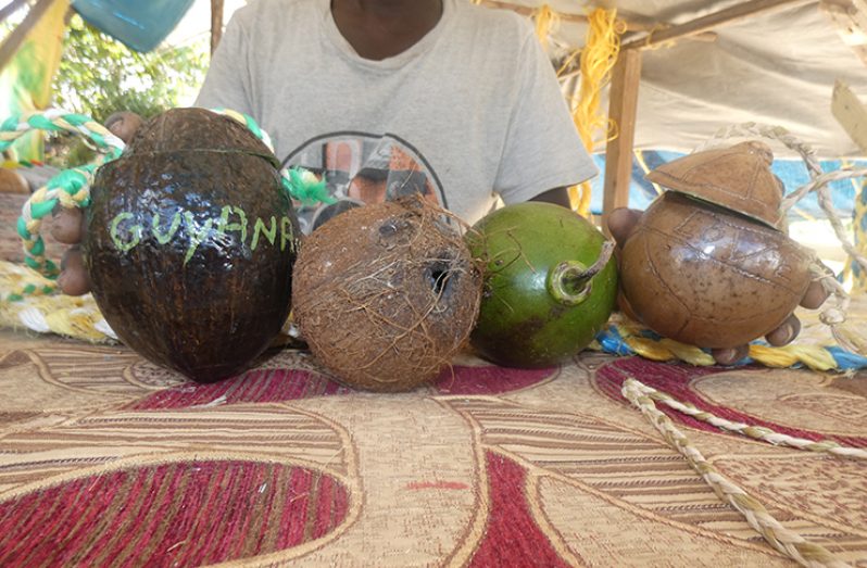 The raw coconut shell and calabash that has been transformed to purses