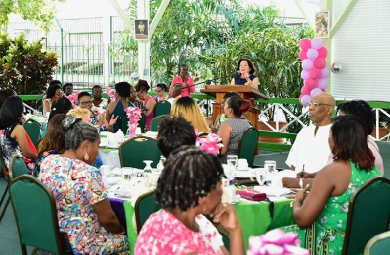 First Lady Sandra Grange speaks at Delices Appetisantes, an event honouring women, held at State House (Ministry of the Presidency photo)