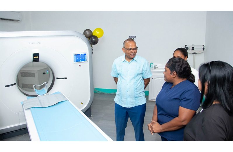 Minister of Health, Dr. Frank Anthony, inspects the new $148 million Philips CT 5300 128-slice CT Scanner at the New Amsterdam Hospital