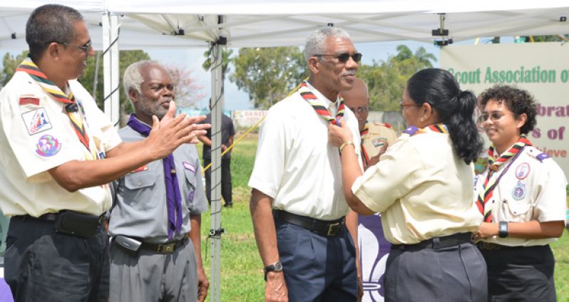 His Excellency at he was bestowed the honours of the national scarf