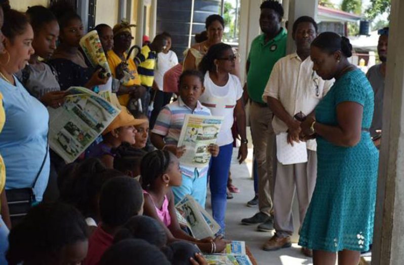 Minister of Education, Dr. Nicolette Henry engaging parents and students
