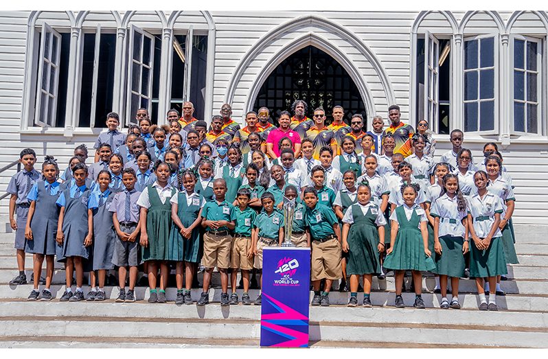 National cricketers, local tournament ambassador, Ramnaresh Sarwan, along with school children at the St. George’s Cathedral