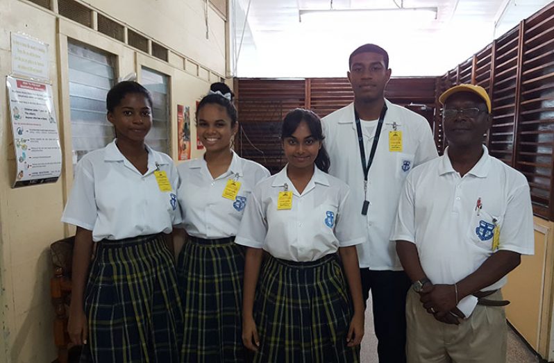 The Marian Academy Physical Education Class of 2017 Relay Fair Committee from left: competition manager Sheniah Grant; Leah Lachmansingh, the project’s sport journalist; Alyssa Persaud, the project’s competition secretary; competitions director Jahleel Young and PE teacher Keith Smith (Stephan Sookram photo)