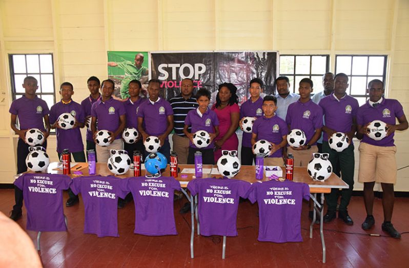 Students of various schools pose with their footballs during yesterday’s presentation ceremony.