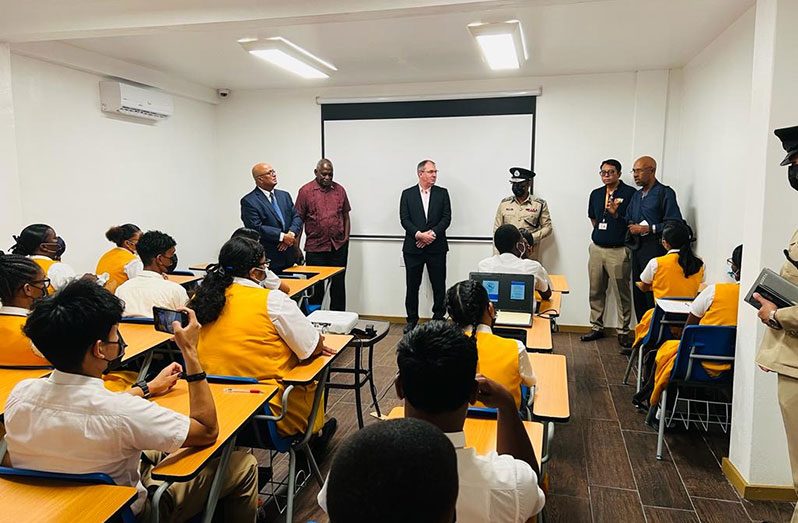 Standing, from left, are: GOGEC President  Manniram Prashad; Home Affairs Minister Robeson Benn; CEO of GTT Damian Blackburn; Commissioner of Police (ag) Clifton Hicken; General Manager of SBM Offshore Guyana, Martin Cheong; and Denis Chabrol of news outlet, Demerara Waves