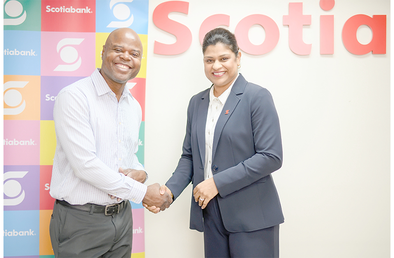 Dmitri Nicholson Executive Director of Youth Challenge Guyana, and Nafeeza Gafoor Country Manager Scotiabank Guyana discuss the Launching Out Programme