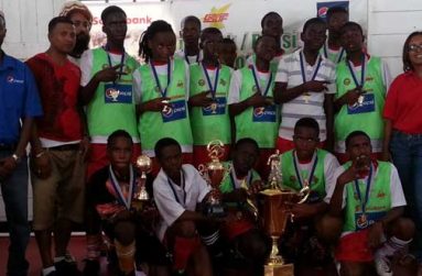 The victorious Berbice Educational Institute team with DDL’s Pepsi Brand Manager Larry Wills (left) and Public Relations Officer of Scotiabank Jennifer Cipriani.