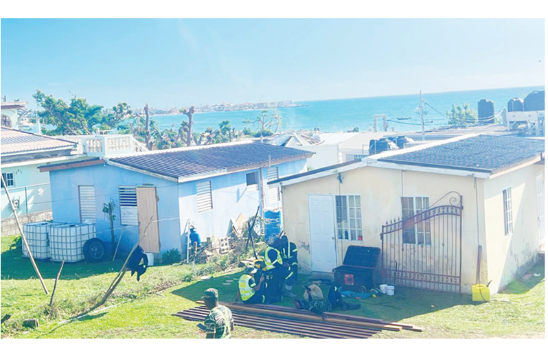 Members of the Guyana Defence Force (GDF) have completed the rebuilding of roofs
of several homes damaged by Hurricane Melissa in Jamaica. During a visit to affected
communities last month, President, Dr Irfaan Ali committed to rebuilding 200 roofs, in
addition to relief supplies already sent to the island (Photos: President Irfaan Ali/Facebook)