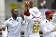 Jayden Seales (left) celebrates one of his five wickets against Australia on the opening day of the first Test at Kensington Oval (Getty Images)