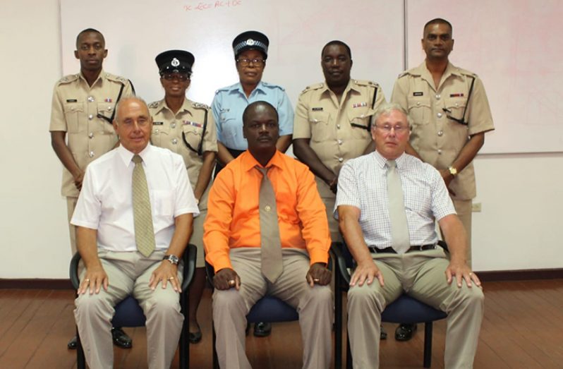 (Center seated) Training Officer Senior Superintendent Royston Andries-Junor flanked by PAI Team Leaders, Paul Mathias and Andrew Odell and senior ranks who benefited from the training.