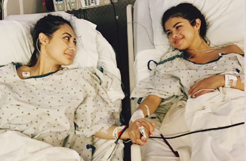 Selena Gomez, right, recovers in hospital with best friend Francia Raisa after her kidney transplant