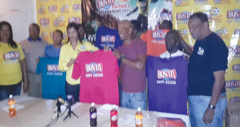 Managing Director of Guyana Beverage Company, Robert Selman (right), Marketing Director Shameiza Yadram (extreme left) and Petra Director Troy Mendonca (2nd left) share the moment as Christine Kellawan, Marketing Director of S.M Jaleel hands to Sherwin ‘German’ Grimes, his team’s jerseys.