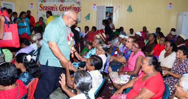 President Donald Ramotar being greeted by senior citizens at Mon Repos