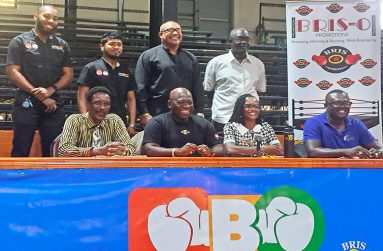 (From left sitting) Elton Chase, Seon Bristol,Kesha Sertima and Niyen Sinclair. (Standing) representatives of the sponsors (Sean Devers photo)