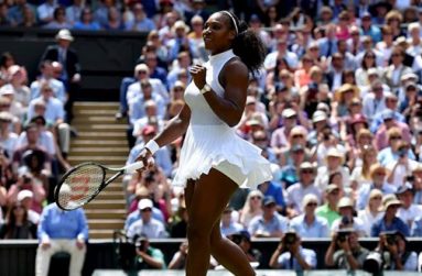 Serena Williams celebrates winning her match against Russia's Elena Vesnina at the All England Lawn Tennis & Croquet Club, Wimbledon, England yesterday. (REUTERS/Toby Melville)