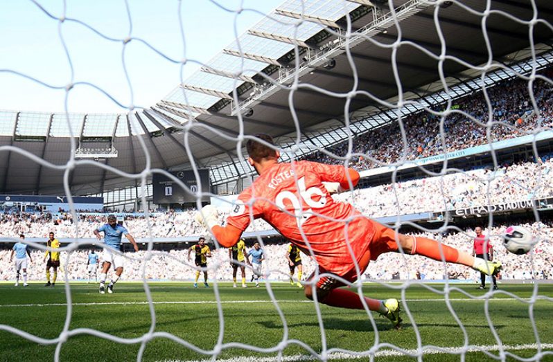 Manchester City’s Sergio Aguero scires their second goal from the penalty spot. (Reuters photo)