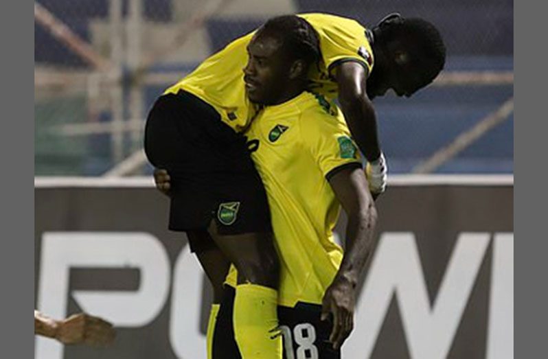 Michail Antonio (#18) celebrates his goal with a teammate on Tuesday