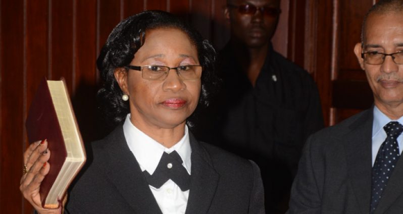 Chief Justice (ag) Yonette Cummings-Edwards is sworn as a member of the JSC