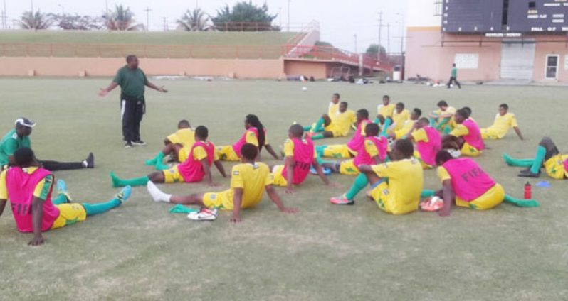 Head coach Jamaal Shabazz addresses the team during their final practice session last evening at the Guyana National Stadium, Providence.