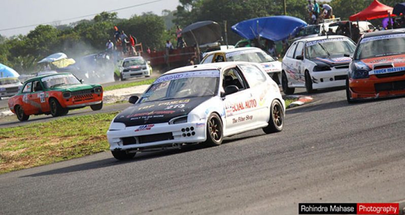 Group two driver Shan Seejatan leads the pack at last year’s final leg of the CMRC 2015 in Guyana. (Rohindra Mahase photo)