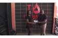 Fireside Grill Manager, Shanaka Reid, presents the cheque to Petra Director, Troy Mendonca