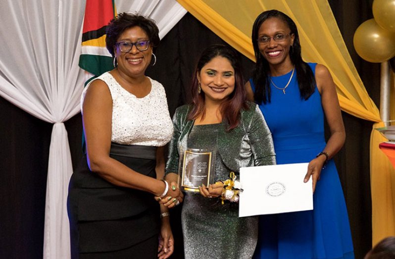 Sharon (centre) was among the 25 most influential women awarded for her work recently