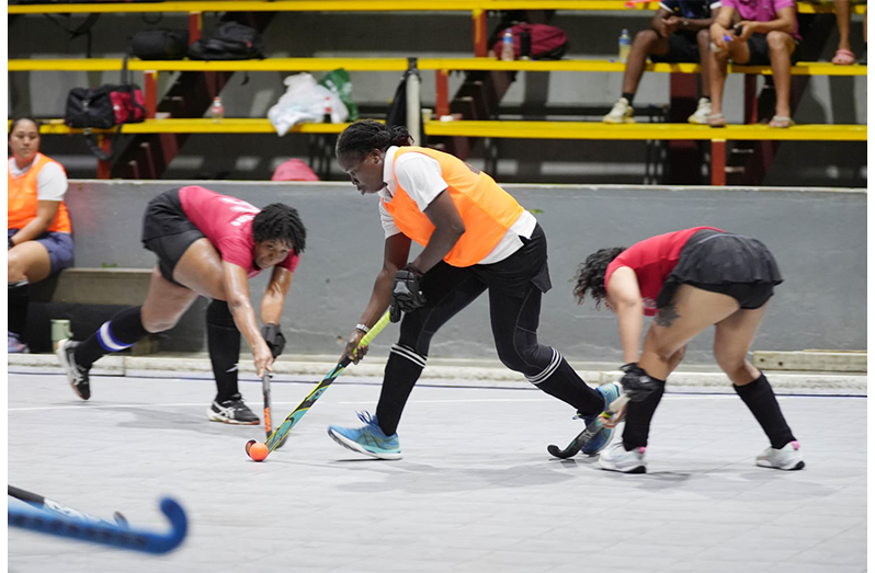 Over-40 striker, Shebiki Baptiste, carves her way through the Old Fort defense.