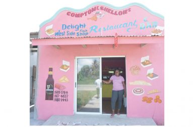 Shellon Sancho in front of her roadside businessplace (Carl Croker photos)