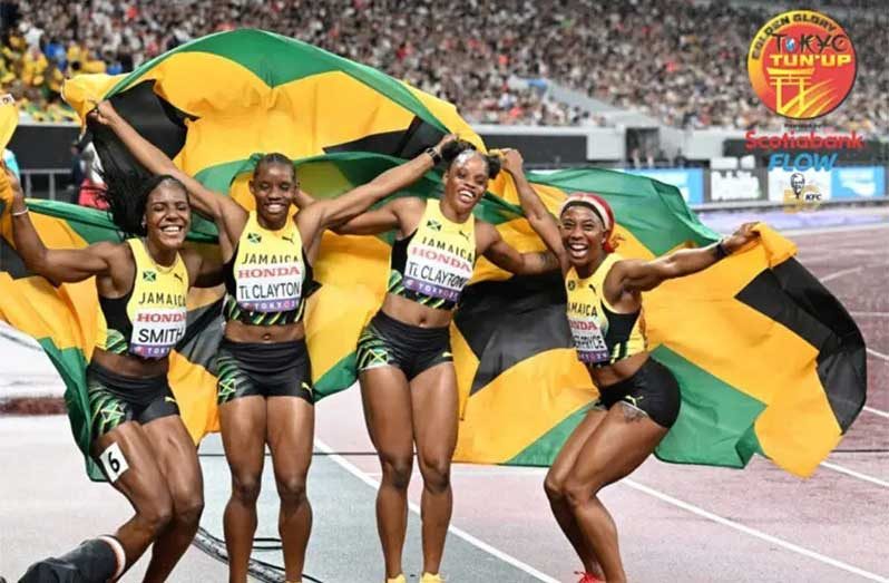 Jamaica's 4x100m women's team of (from left) Jonielle Smith, Tina Clayton, Tia Clayton, and Shelly-Ann Fraser-Pryce celebrate after claiming silver at the World Athletics Championships in Tokyo, Japan on Sunday, September 21, 2025 (Photo: Garfield Robinso)
