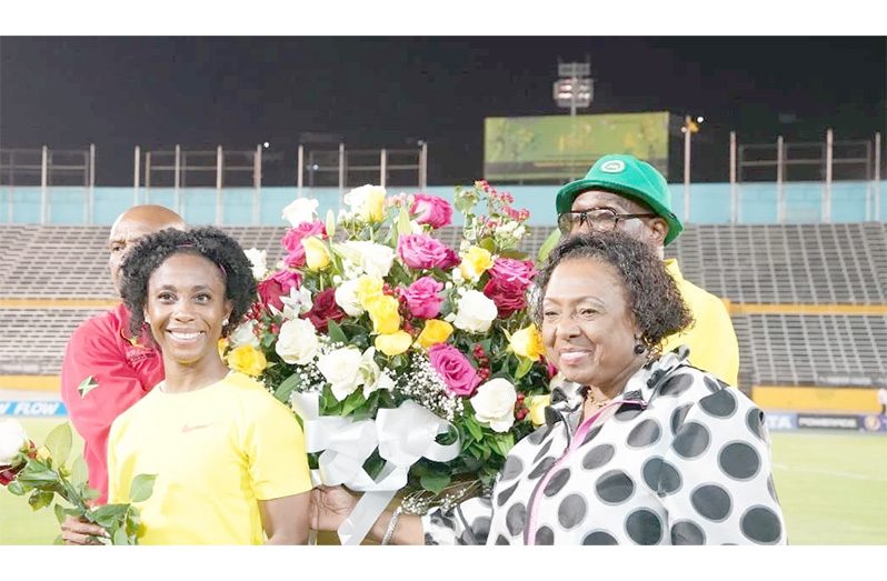 Shelly-Ann Fraser-Pryce with Minister of Sport, Olivia Grange