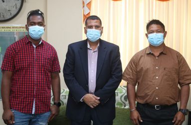 Matarkai Sports Council members Sherlon Rodrigues (right) and Micquel Perez (left) are now executive members of the ROCC. Here they pose with Matarkai Sports Council Patron, Minister of Housing and Water Collin Croal (centre).