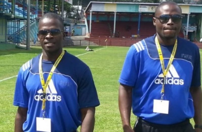 Former FIFA Referees Sherwin Moore (left) and Venton Mars