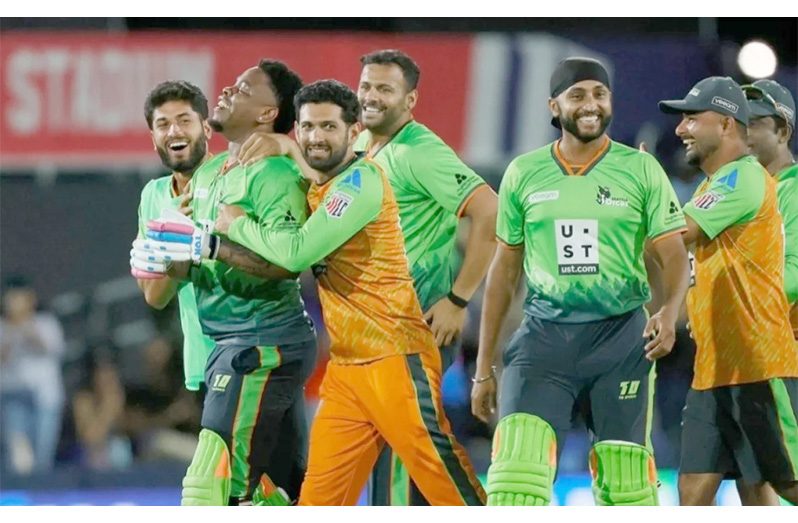 Shimron Hetmyer is mobbed by his teammates following his heroics