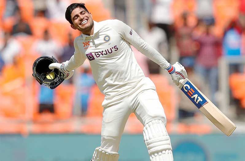 India's captain Shubman Gill celebrates after scoring a century on day one of the second cricket test match between England and India at Edgbaston in Birmingham, England