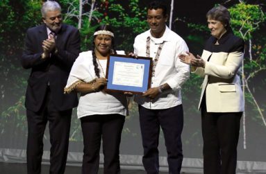 Faye and Nicholas Fredericks accept the Equator Prize 2015 at a ceremony at Theatre Mogador in Paris, December 07, 2015. At right is Helen Clark, Administrator of the the United Nations Development Programme, while at left is her Assistant, Magdy Martínez-Solimán.