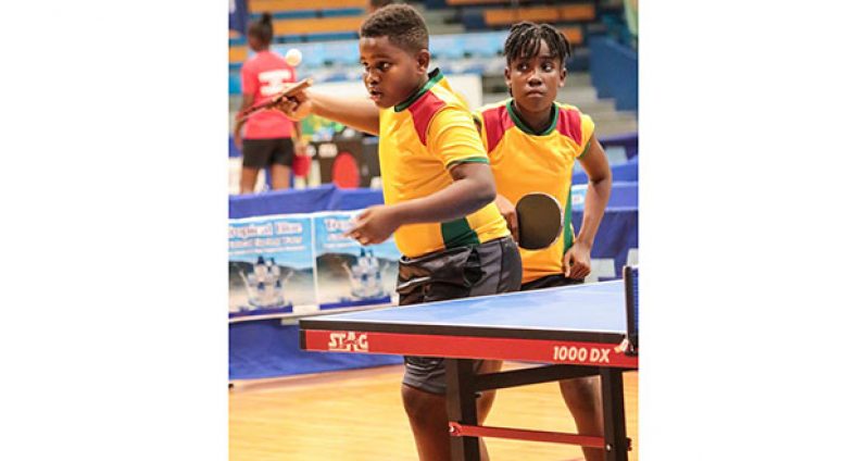 Kaysan Ninvalle and Abigale Martin compete in the Mixed doubles of the 2016 Caribbean Pre-Cadet table Tennis Championships.