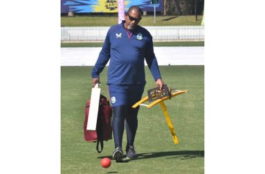 Head coach Phil Simmons during a net session ahead of the opening warm-up against UAE. (Photo courtesy CWI Media)