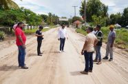 Minister of Public Works, Deodat Indar, meeting with contractors on the construction site