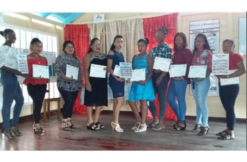 The women who graduated from the cosmetology programme